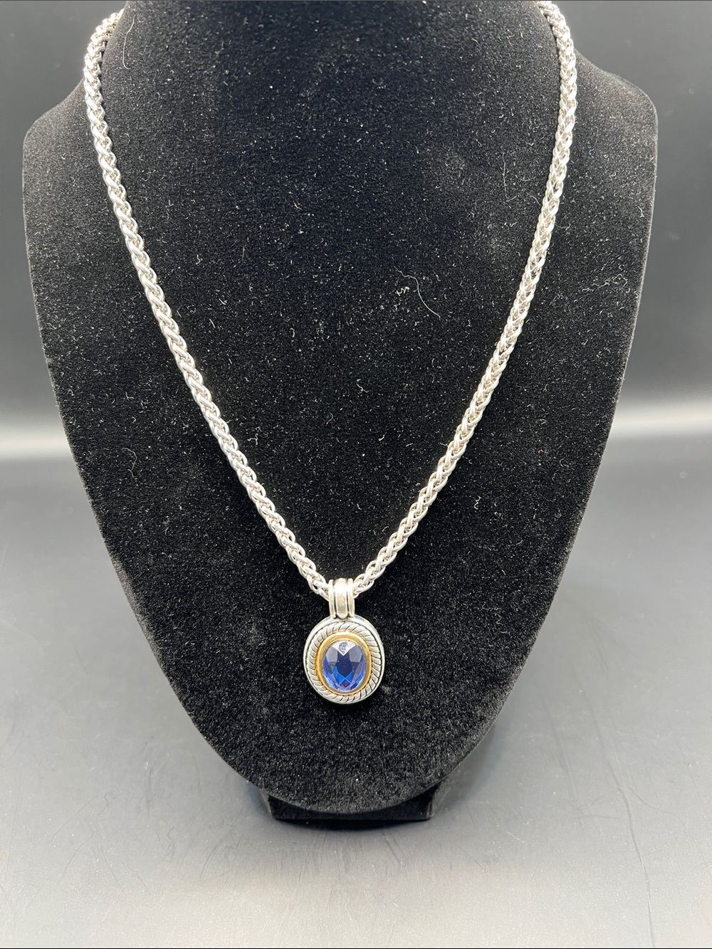 Silver Necklace with Blue Faceted Pendant